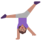 Woman Cartwheeling- Medium Skin Tone emoji on Microsoft